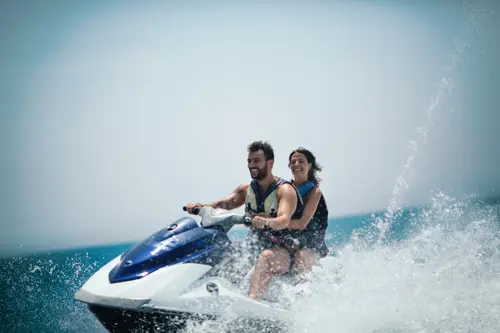 Couple on a personal watercraft